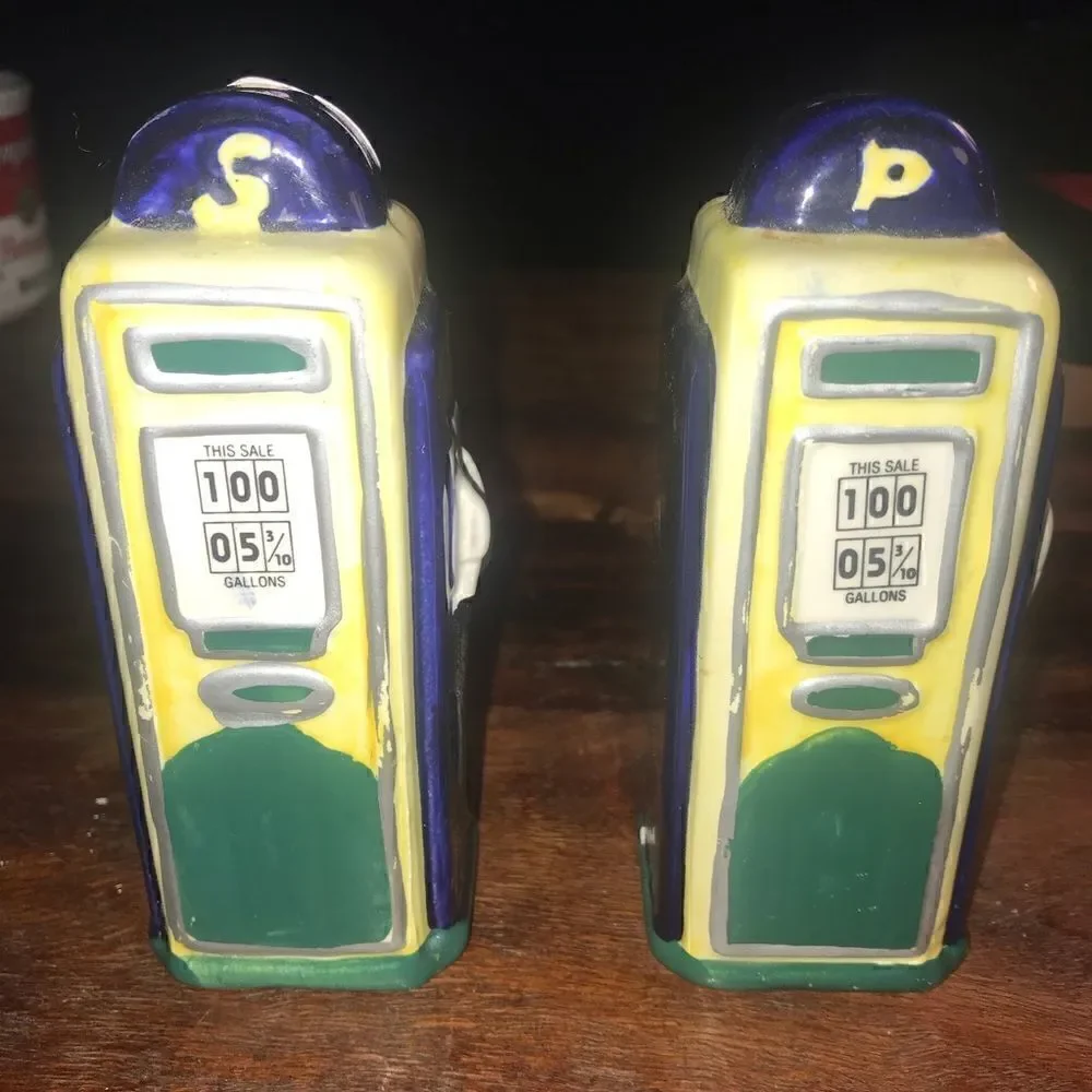 VINTAGE OCI OMNIBUS GAS STATION PUMP SALT & PEPPER SHAKERS MADE IN SRI LANKA.